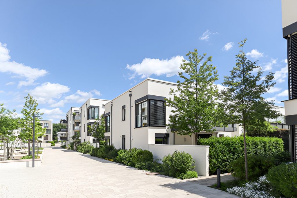 white modern houses with flat roofs